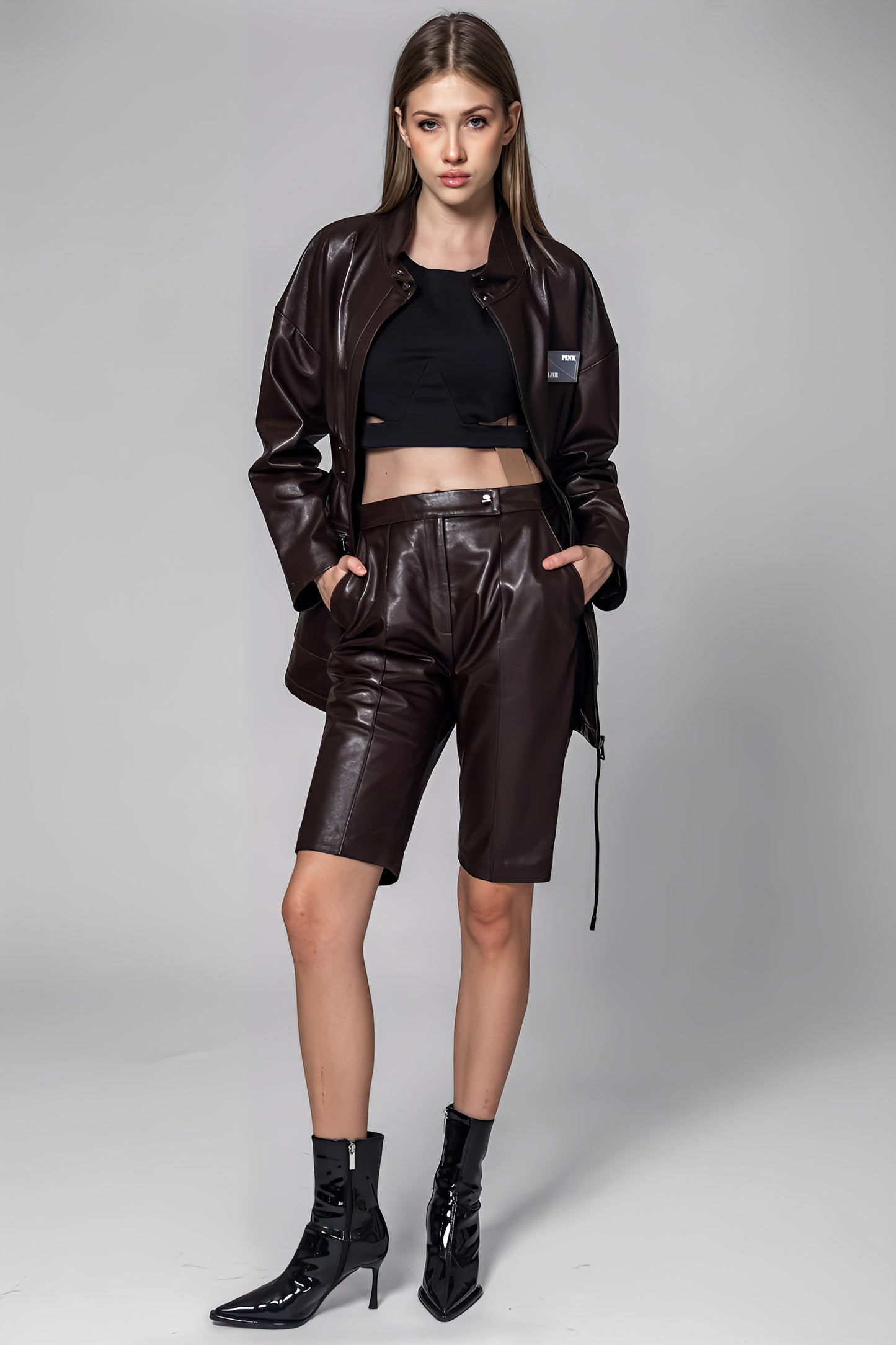 
                  
                    BLACK/BROWN GENUINE LEATHER BERMUDA SHORTS
                  
                