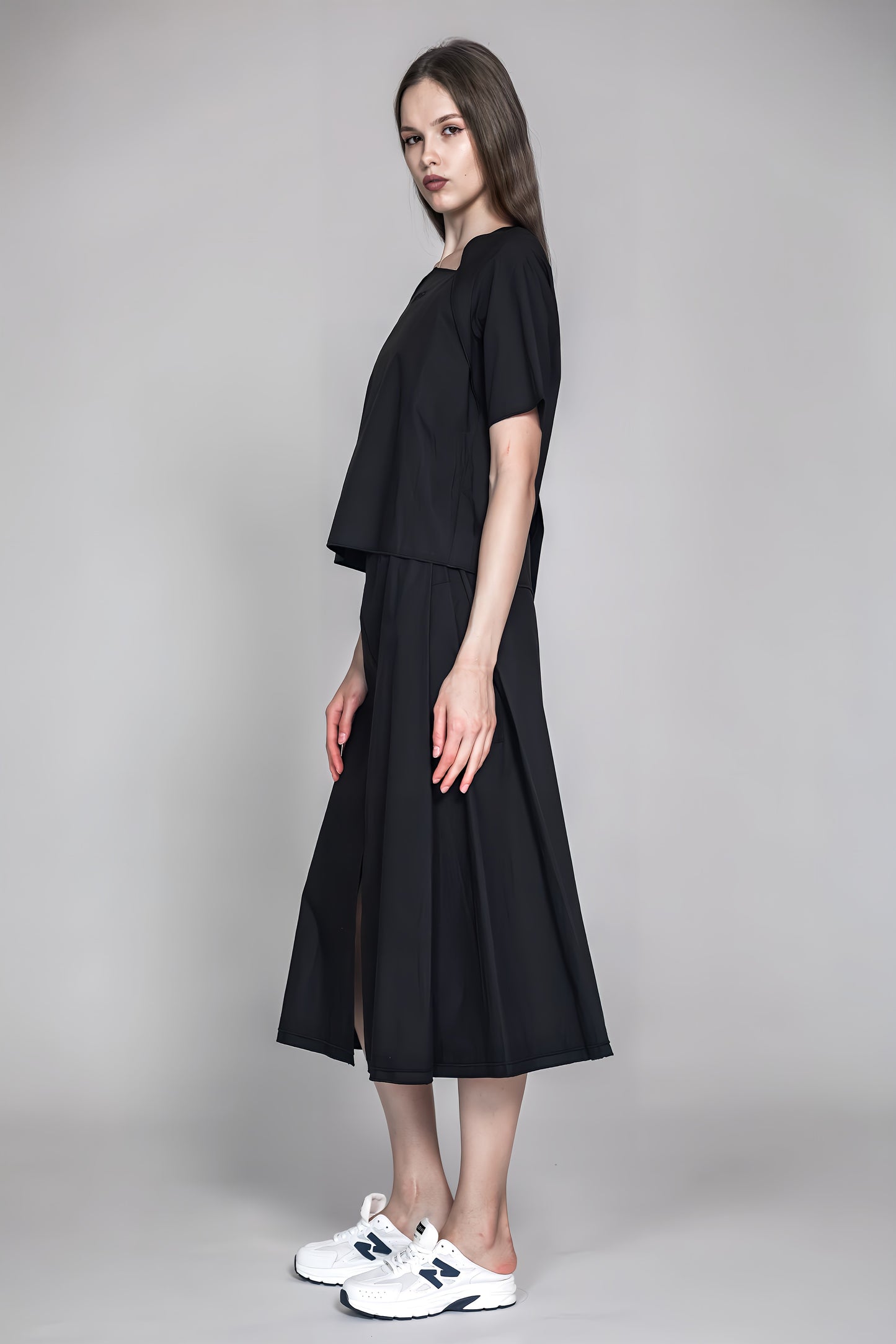 
                  
                    BLACK COTTON GAUZE FUTURISTIC TOP
                  
                
