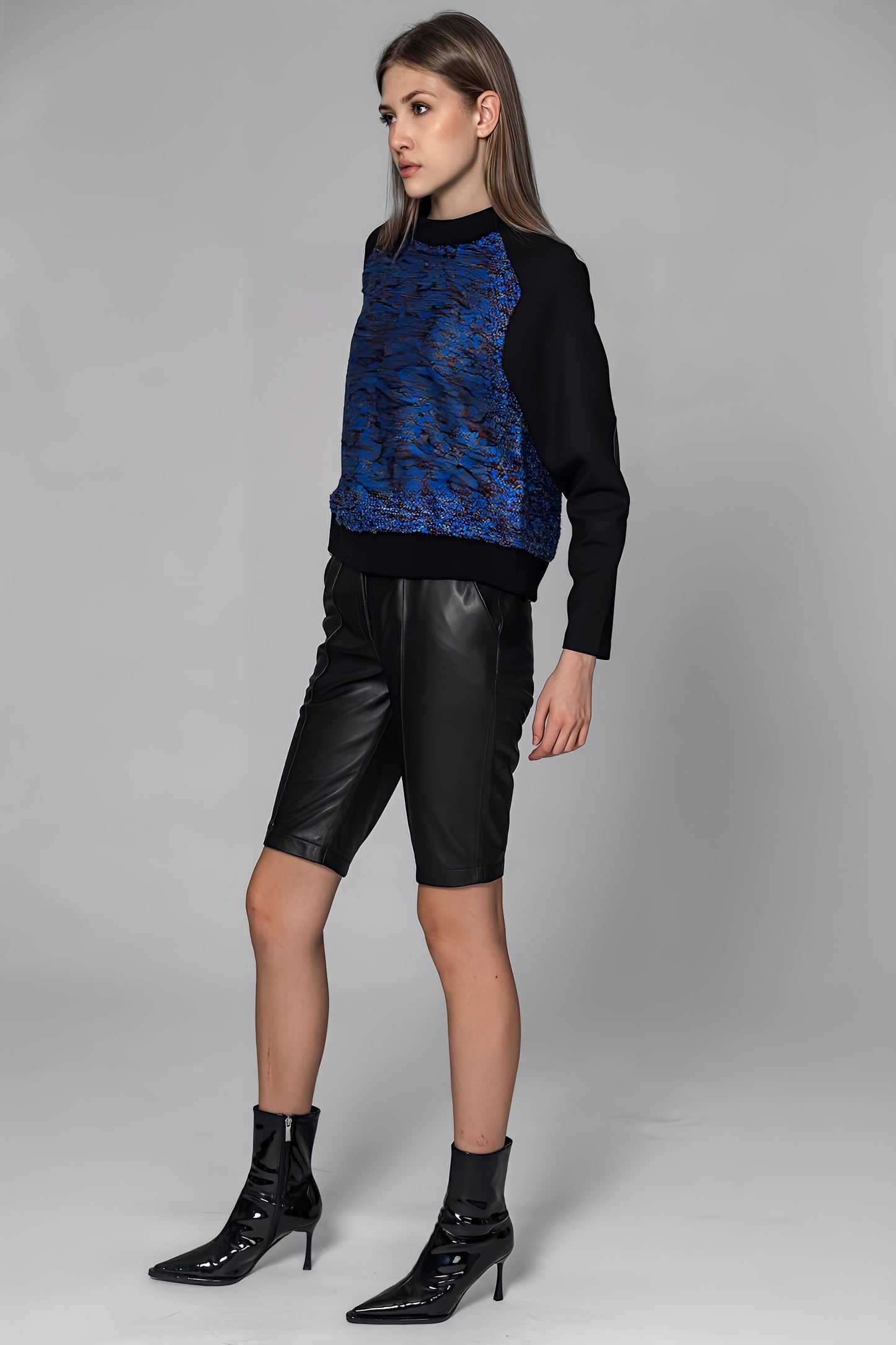 
                  
                    CROPPED PANELLED LEATHER SWEATSHIRT
                  
                