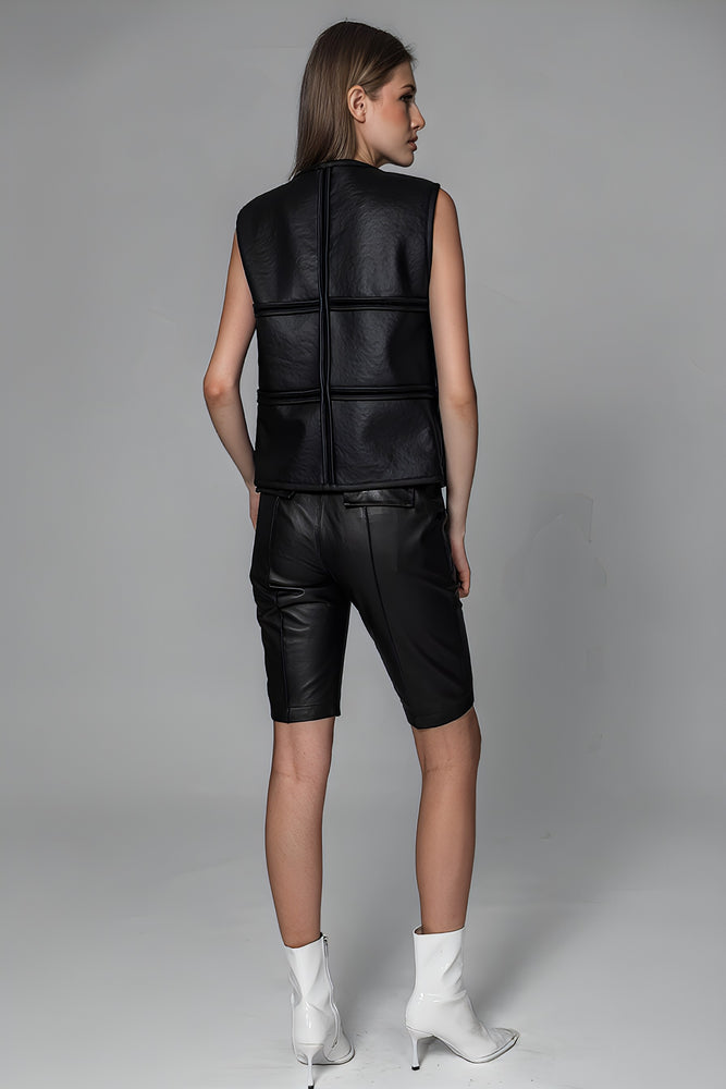 
                  
                    BLACK TEXTURED FUR AND LEATHER REVERSIBLE VEST
                  
                