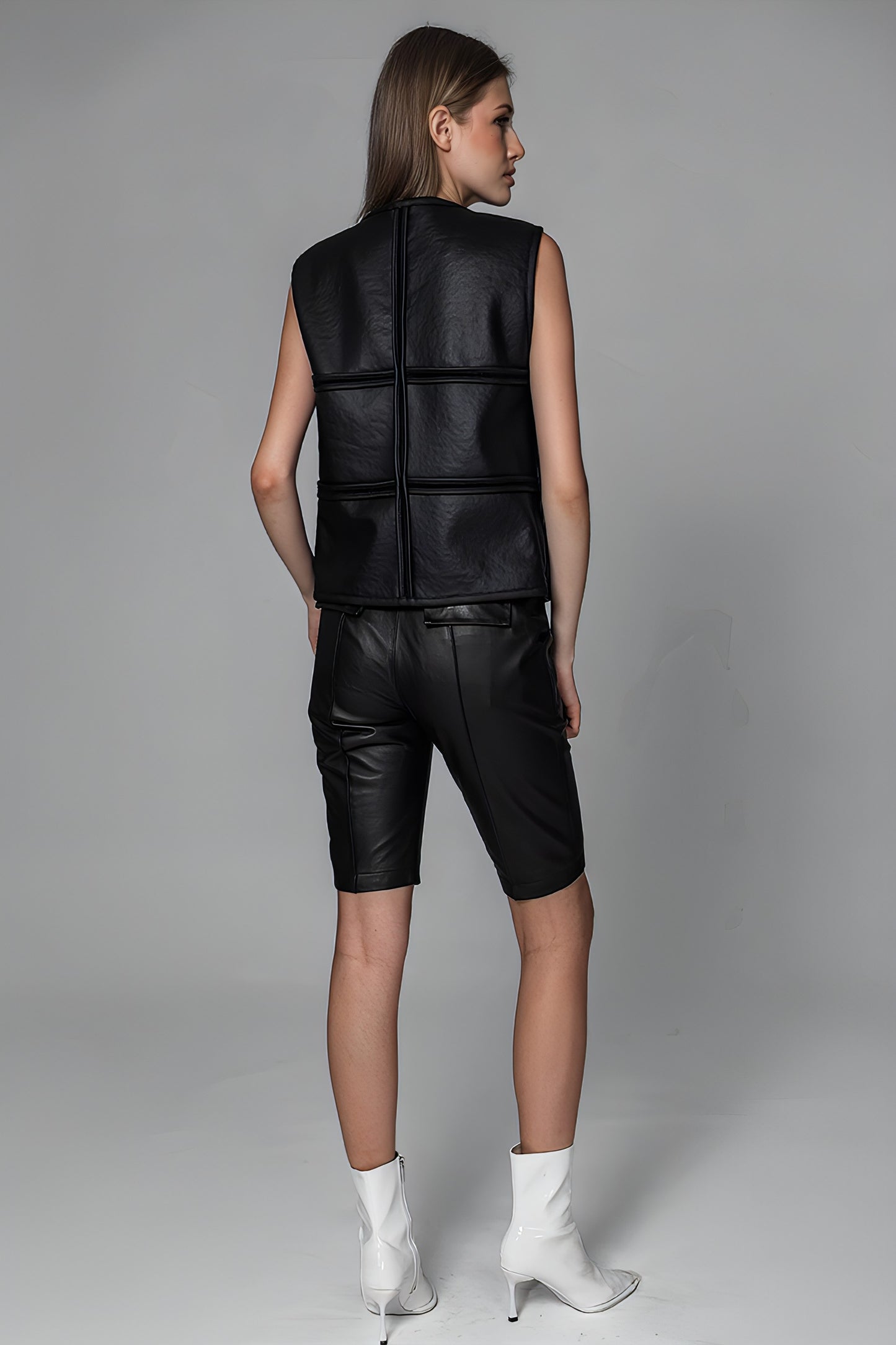 
                  
                    BLACK TEXTURED FUR AND LEATHER REVERSIBLE VEST
                  
                