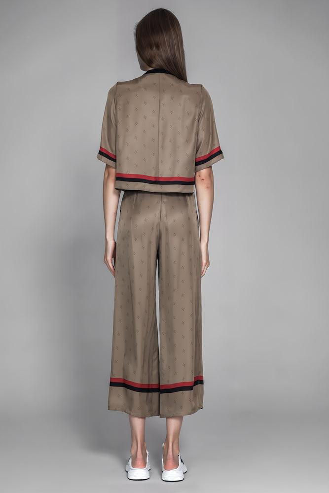 
                  
                    LOTUS GREY/BROWN LOGO PRINT LOOSE LONG PANTS
                  
                
