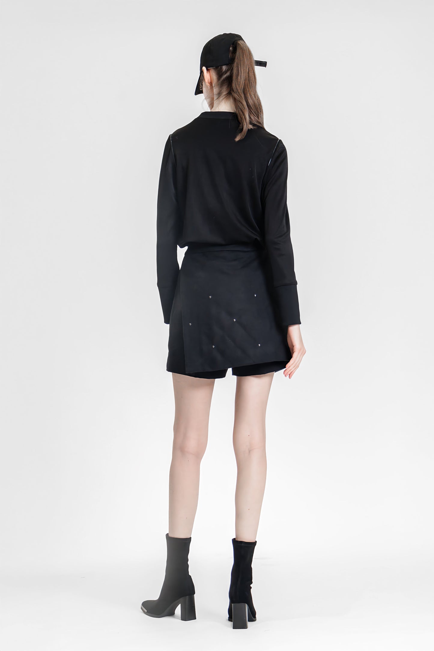 
                  
                    BLACK ASYMMETRICAL DESIGN WITH BUTTONS SHORTS
                  
                