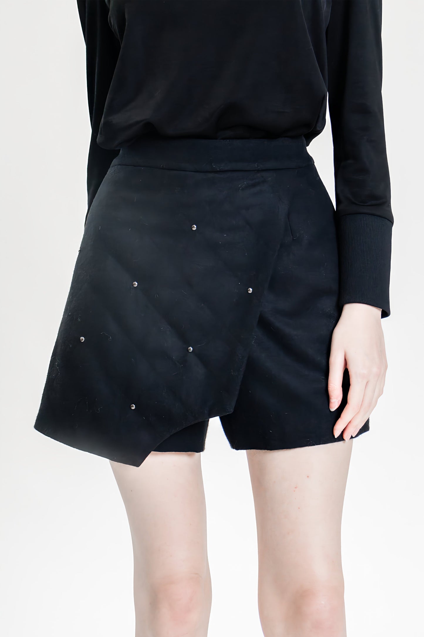 
                  
                    BLACK ASYMMETRICAL DESIGN WITH BUTTONS SHORTS
                  
                