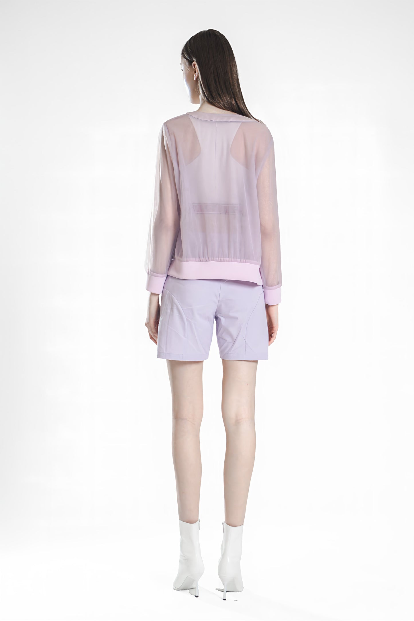 
                  
                    PEACHY ROSY BEIGE / ICE PURPLE CURVED SEAM SHORTS
                  
                